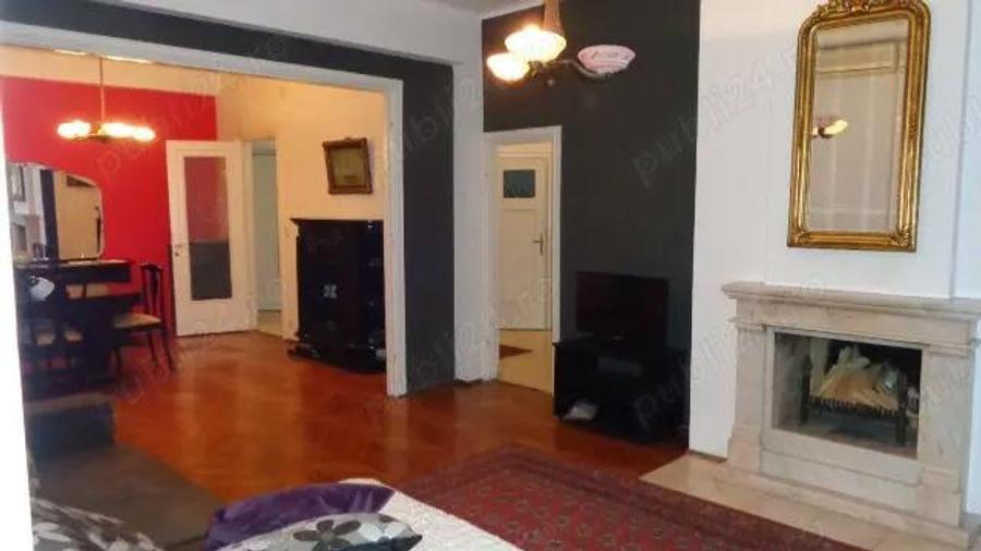 Apartament cu 4 camere, cu o suprafa?a utila de 105 m2, situat intre Pia?a Romana ?i Calea Victoriei - 9