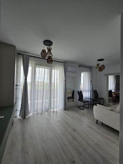 Apartament cu 2 camere semidecomandat, mobilat în Torontalului