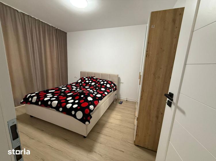 APARTAMENT DECOMANDAT CU TERASA DE 18 MP SI GRADINA - - 4