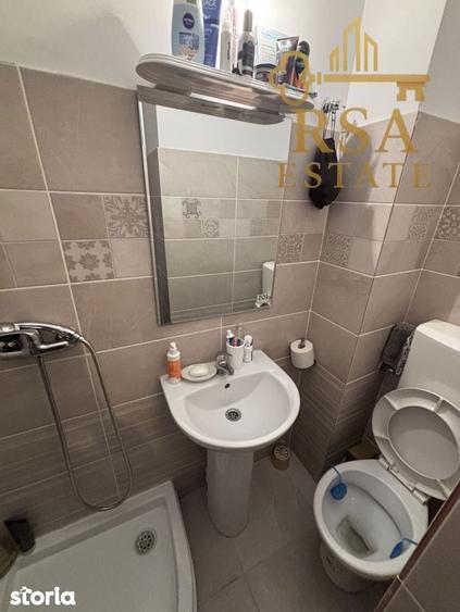 Garsoniera de vanzare etaj 1 zona Dovali Rm Valcea - 2