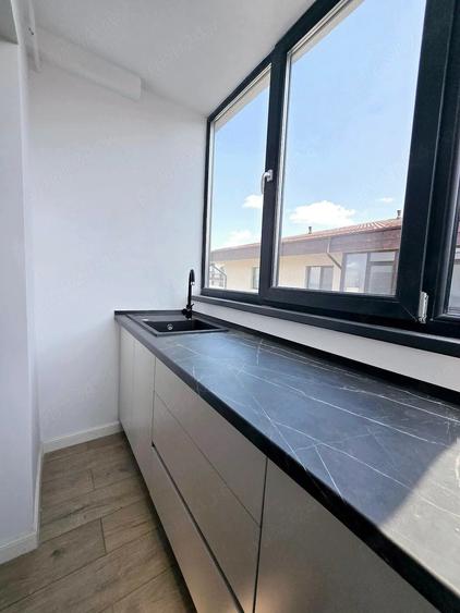 Apartament cu 4 camere decomandat în Dobroești