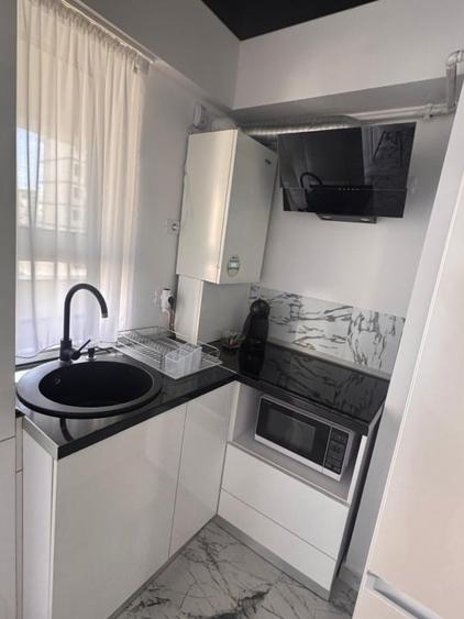 Apartament cu 2 camere semidecomandat, mobilat în Nord