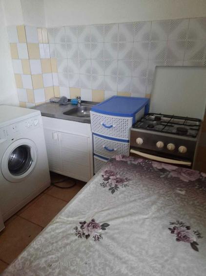 garsoniera calea bucuresti bloc carrefour - 4