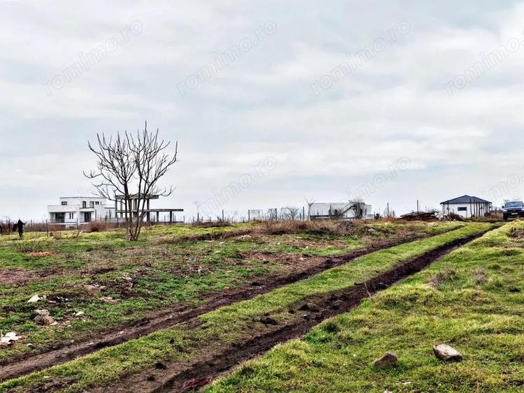 Teren intravilan - 630 mp cu deschidere de 20 ml - 8