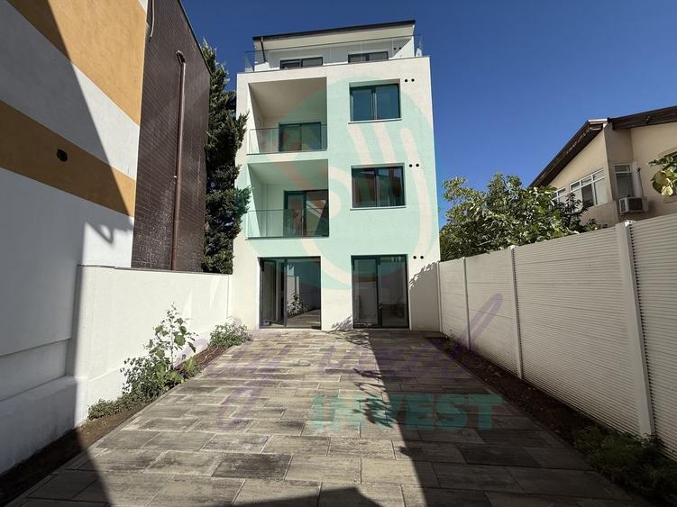 Apartament cu o curte generoasa de 60 mp - 1