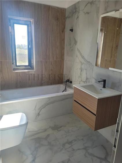 Casă individuală cu 5 camere cu Teren 400 Mp în Tunari