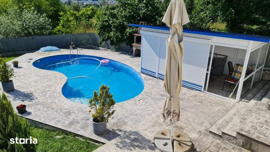 Casă cu 4 camere cu Teren 881 Mp în Curtea de Argeș