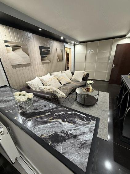 Apartament cu 2 camere semidecomandat, mobilat în Basarabia