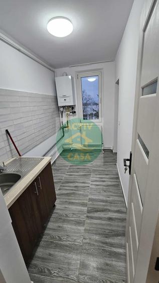 Apartament cu 3 camere semidecomandat în Central