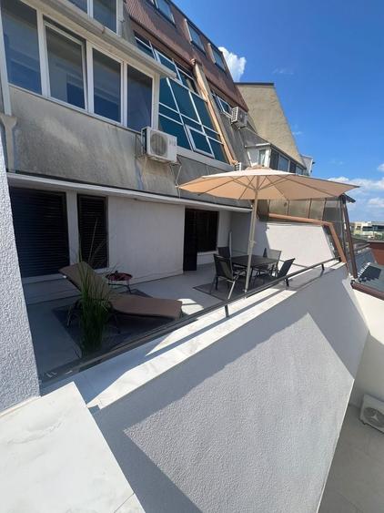Apartament cu 3 camere, mobilat în Faleza Nord