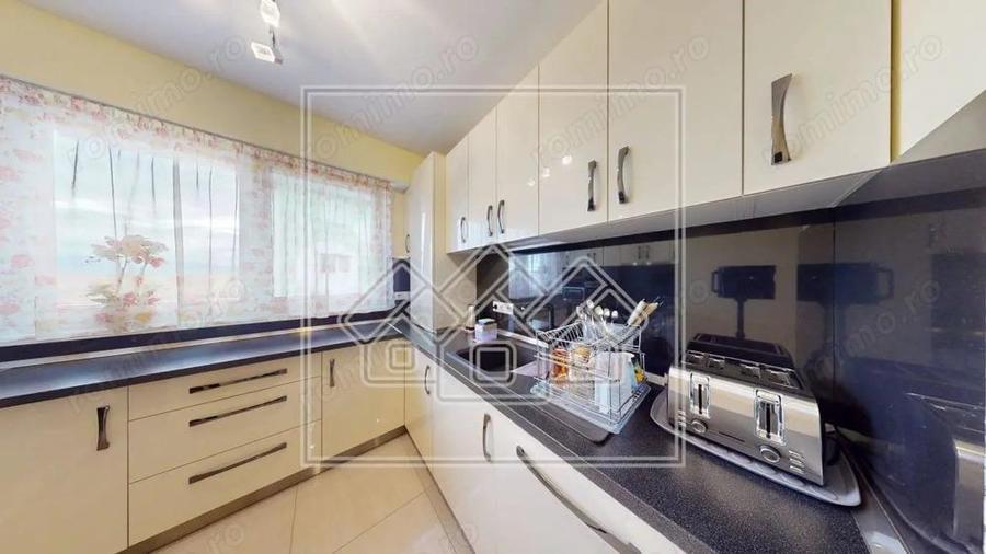 Ap.cu 3 camere, 2 bai si balcon, etaj intermediar, mobilat si utilat - 8