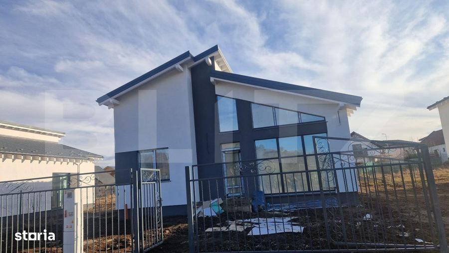 Casa Harman individuala , 500 mp teren , moderna, intabulata toate uti - 1