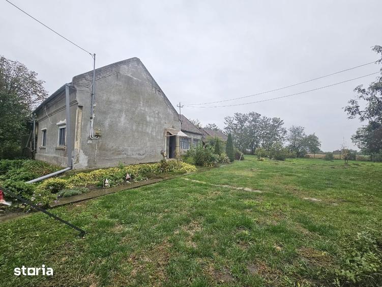 Casă cu 3 camere cu Teren 1000 Mp în Curtuișeni