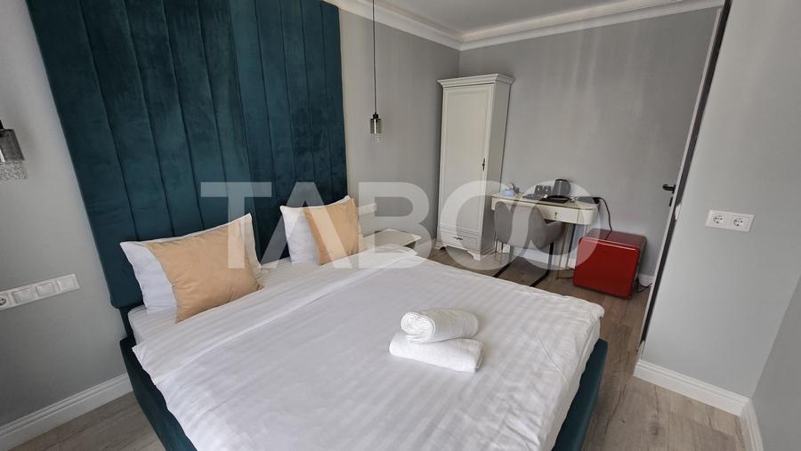 Pensiune de vanzare cu 11 camere 9 bai filigorie parcari zona Turnisor - 2