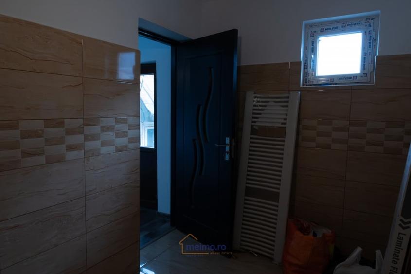Casă cu 3 camere cu Teren 400 Mp în Comănești