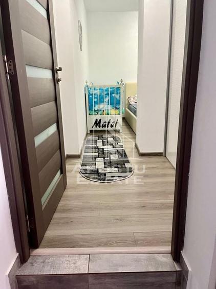 Doua apartamente la curte comuna,zona Traian - 10