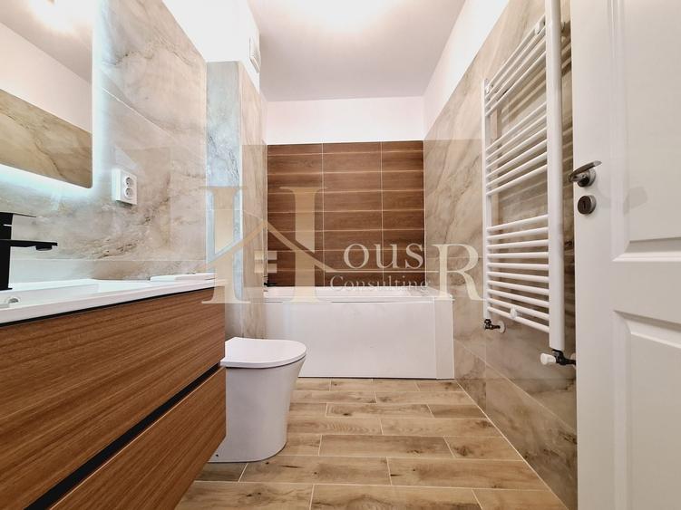 Spatios, 55 mp utili. Decomandat. Bucatarie inchisa. - 12