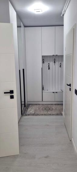 Vind apartament cu 2 camere bloc nou. Cu parcare privata - 4
