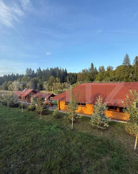 Cabana din lemn rotund, 2 camere, 140 mp, teren 2800 mp, Pal - 5