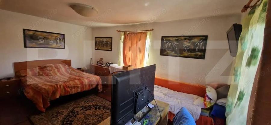 ROMANESTI, casa modesta, 651 mp teren, zona foarte buna - 10