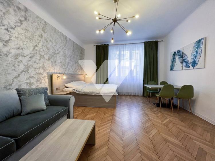 Apartament cu 2 camere semidecomandat, mobilat în Central