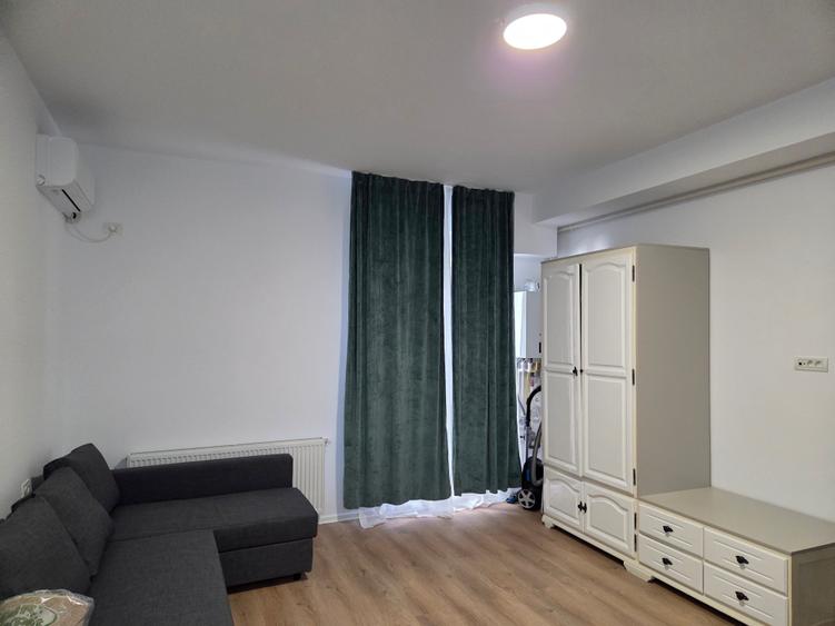 Garsoniera utilata,mobilata ,totul nou ,prima inchiriere ,str Oituz nr 71 - 9