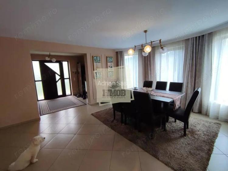 Casa cu 4 camere 3 bai garaj inchis si teren 1100 mp in Tocile