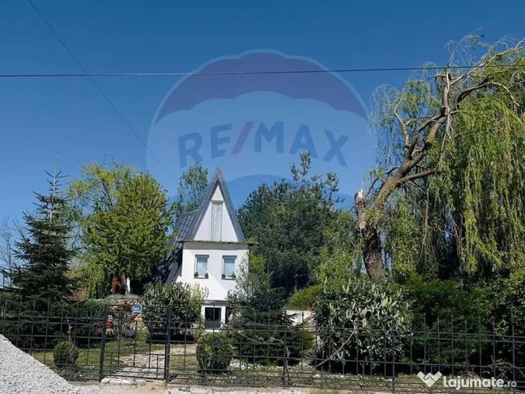 Casa / Vila cu 4 camere de vanzare - 1