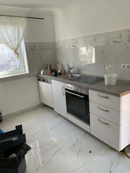 vand casa la tara in rate - 1