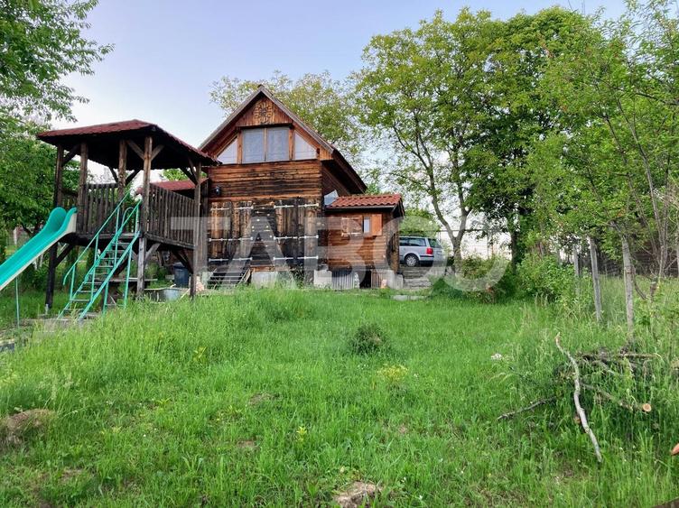 Casa de vacanta de vanzare cu livada de 640 mp in Tropinii Noi - 1