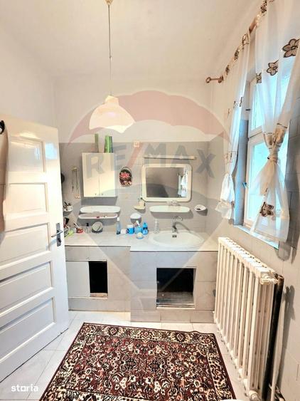 Casa cu 5 camere de vanzare in centrul orasului Talmaciu - 11