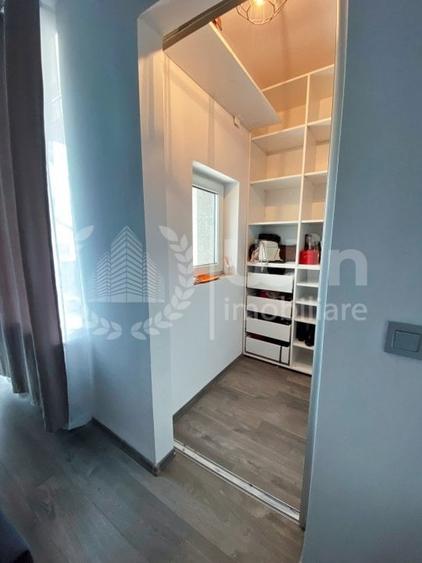 Apartament cu 2 camere semidecomandat, mobilat în Borhanci