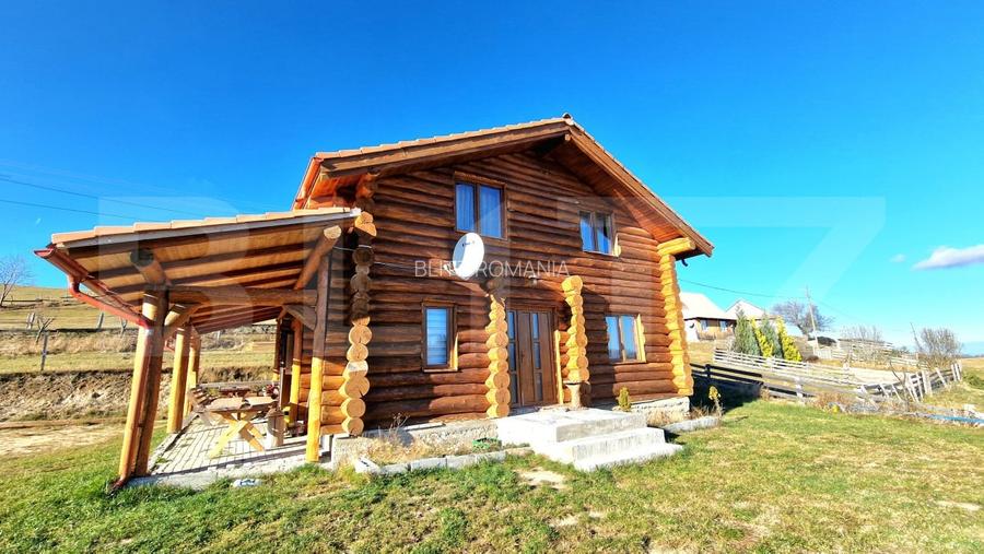 Cabana din lemn rotund, 140 mp utili, 1000mp teren - zona turistica Marisel