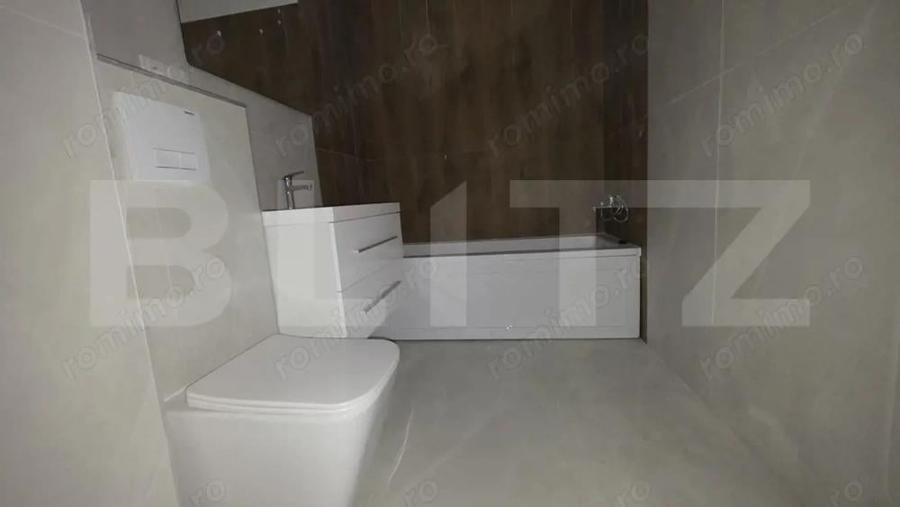 Apartament 3 camere, 62,65 mp, 2 bai, balcon 9,10 mp, finisaje premium - 2