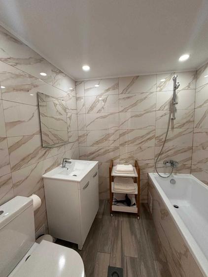Apartament cu 4 camere decomandat în Central