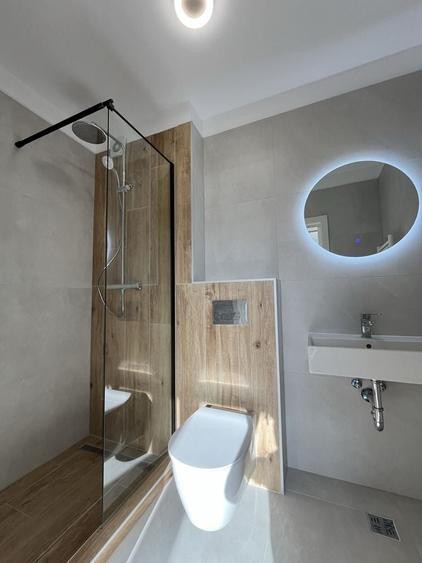 Apartament cu 3 camere decomandat în Tractorul