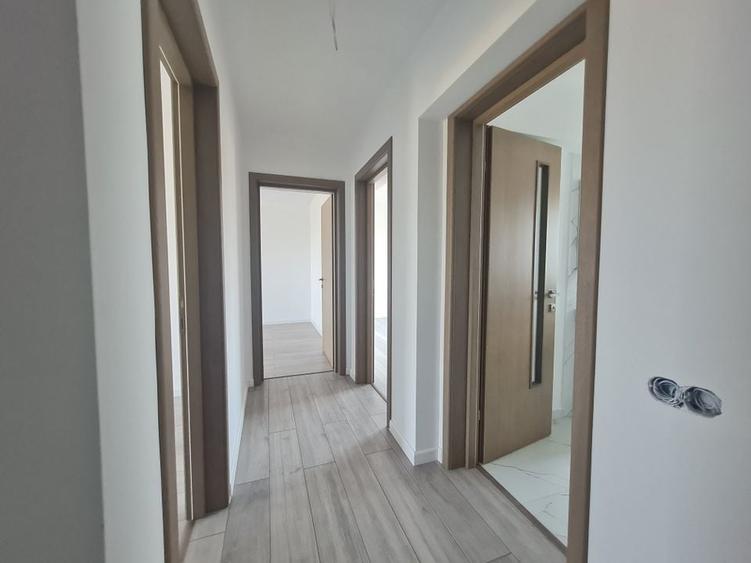 Vila cu 4 camere,2 bai,finisaje deosebite,curte 330 mp - 11