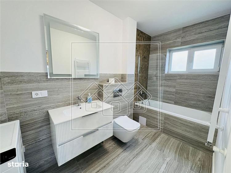 Ap. 3 camere, 2 bai si terasa 15,44 mp - decomandat - prima inchiriere - 1