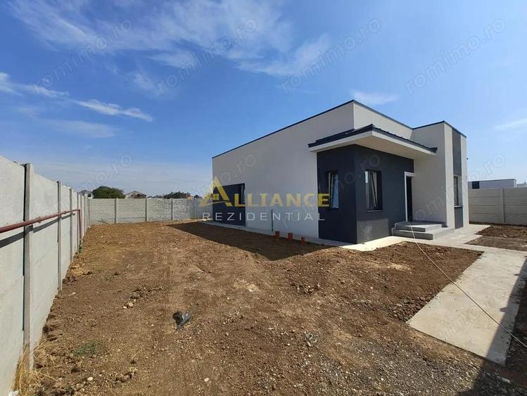 Casa individuala - 82 mp utili + terasa 13 mp - Teren- 380 mp - 9