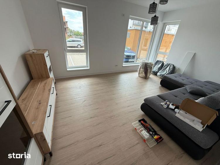 APARTAMENT DECOMANDAT CU TERASA DE 18 MP SI GRADINA - - 8