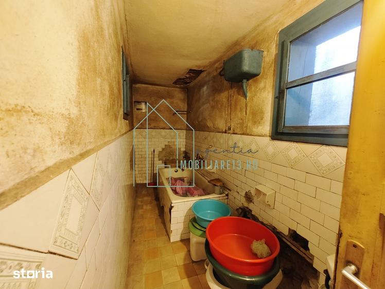 Casă cu 4 camere cu Teren 300 Mp în Central