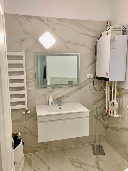 Apartament cu 2 camere semidecomandat, mobilat în Cișmigiu