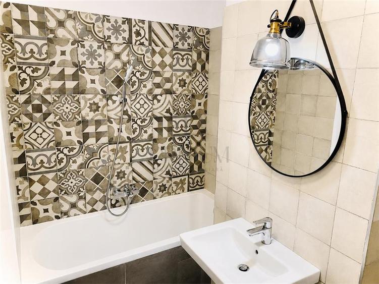 Apartament cu 2 camere semidecomandat, mobilat în Take Ionescu