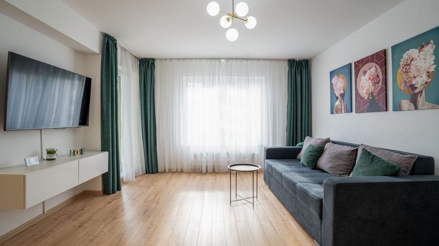 Apartament cu 2 camere semidecomandat, mobilat în Tractorul