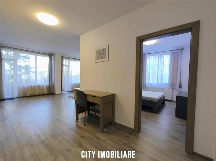 Apartament cu 2 camere semidecomandat, mobilat în Borhanci