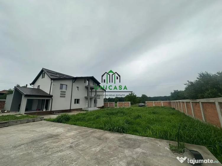Casă cu 7 camere cu Teren 2000 Mp în Români