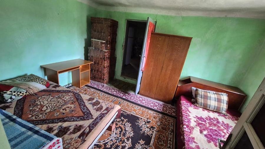 Casă cu Teren 1464 Mp în Plopșoru