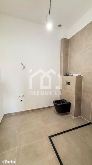 Casă cu 4 camere cu Teren 750 Mp în Jucu