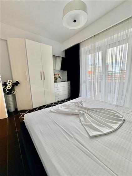 Apartament cu 2 camere decomandat, mobilat în Exterior Est