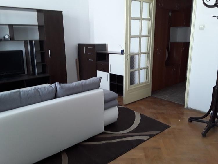 Apartament cu 2 camere semidecomandat, mobilat în Universitate